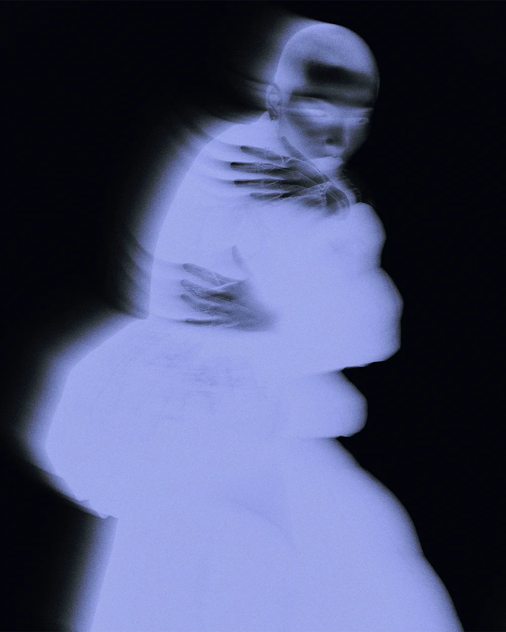 Ethereal blue-toned editorial figure with motion blur and hands resting on the body against a black background – Sbranzo Alessandro Valori Studio Vago Yumi